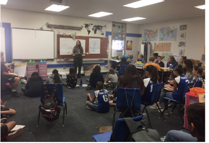 Mesa Verde park ranger talking to students about what it takes to create a museum exhibit. 
